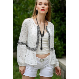 Veste en broderie anglaise et franges