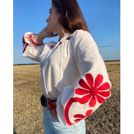 Blouse à broderie florale et pampilles