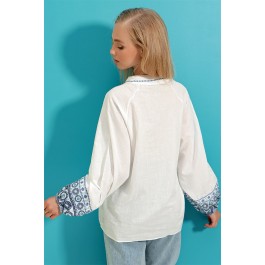 Blouse à broderies géométriques