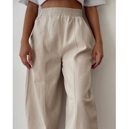 Pantalon fuselé en toile de coton beige