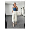 Pantalon fuselé en toile de coton blanc