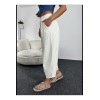 Pantalon fuselé en toile de coton blanc