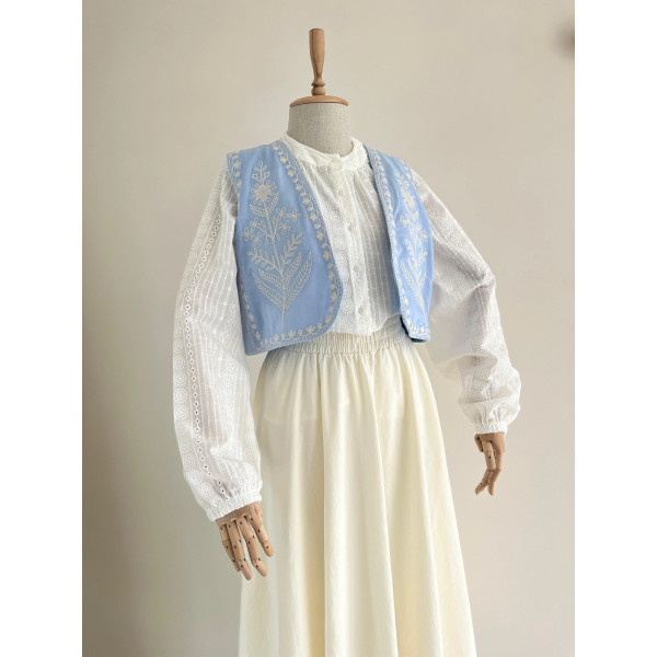 Gilet bleu sans manches brodé